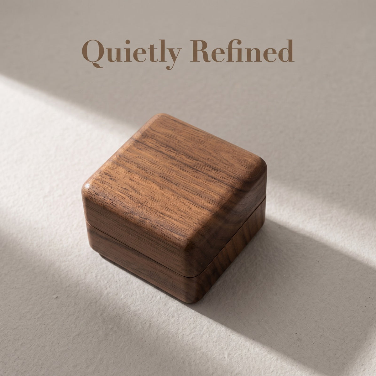 Walnut ring box closed, on a plain surface - Beacon - MAHOOSIVE