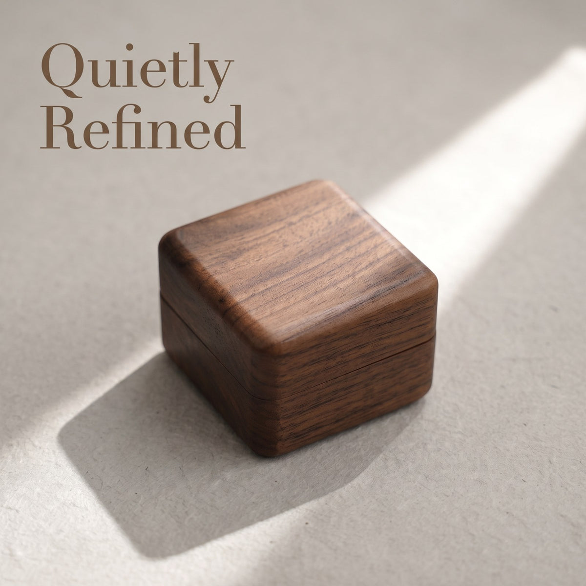Walnut ring box closed, on a plain surface - Covenant - MAHOOSIVE