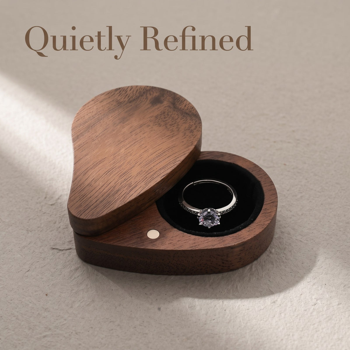 Walnut ring box closed, on a plain surface - Devotion - MAHOOSIVE