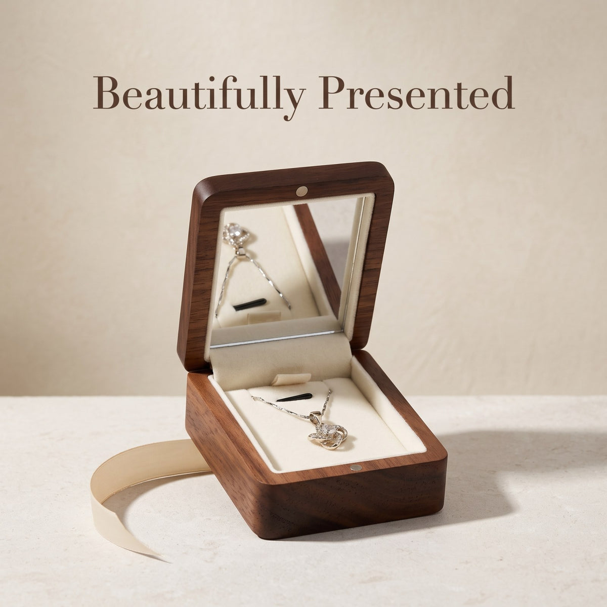 Walnut jewellery box holding a pendant necklace - Locket: Where the Necklace Rests - MAHOOSIVE