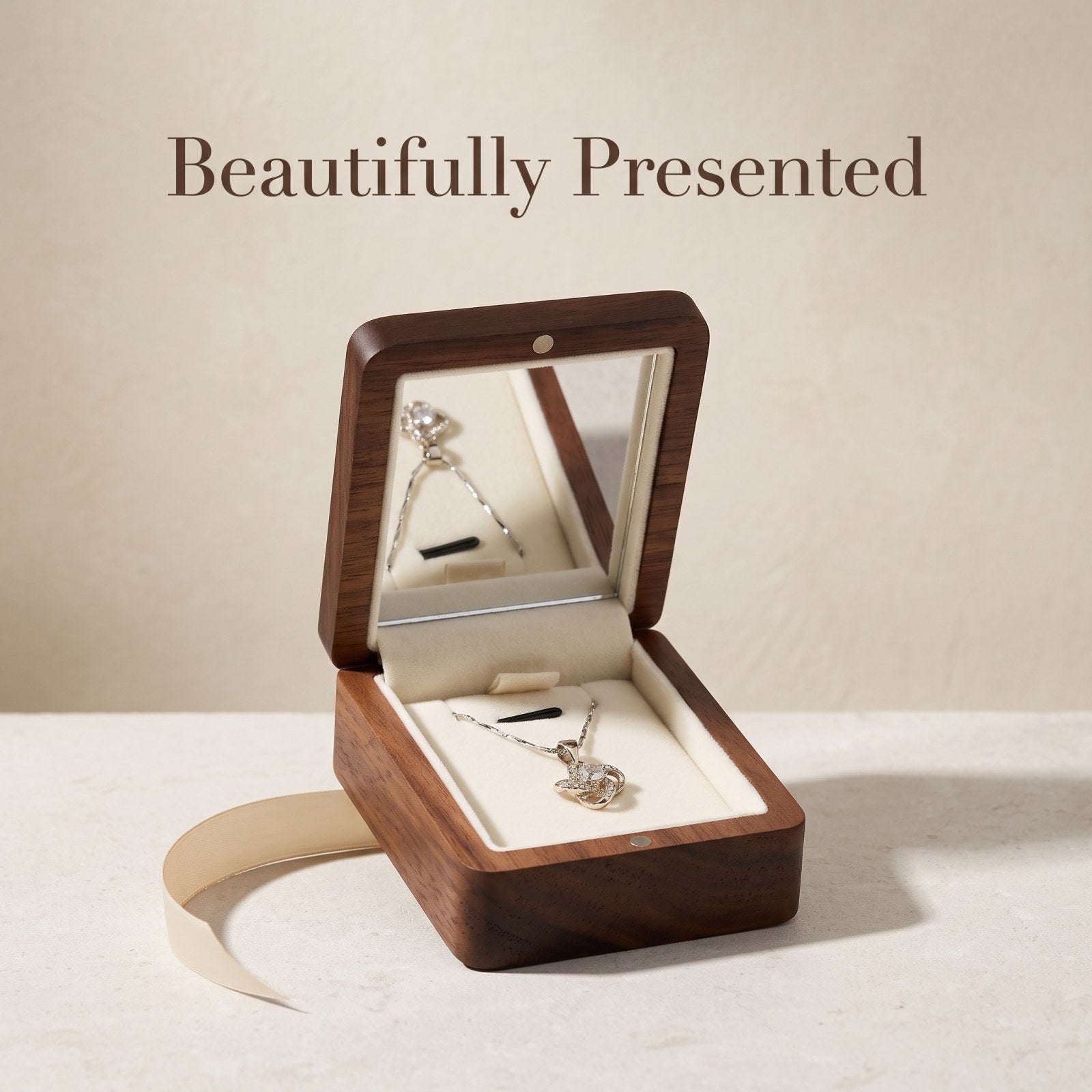 Walnut jewellery box holding a pendant necklace - Locket: Where the Necklace Rests - MAHOOSIVE