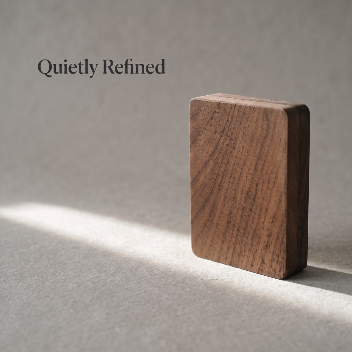 Walnut ring box closed, on a plain surface - Pivot - MAHOOSIVE