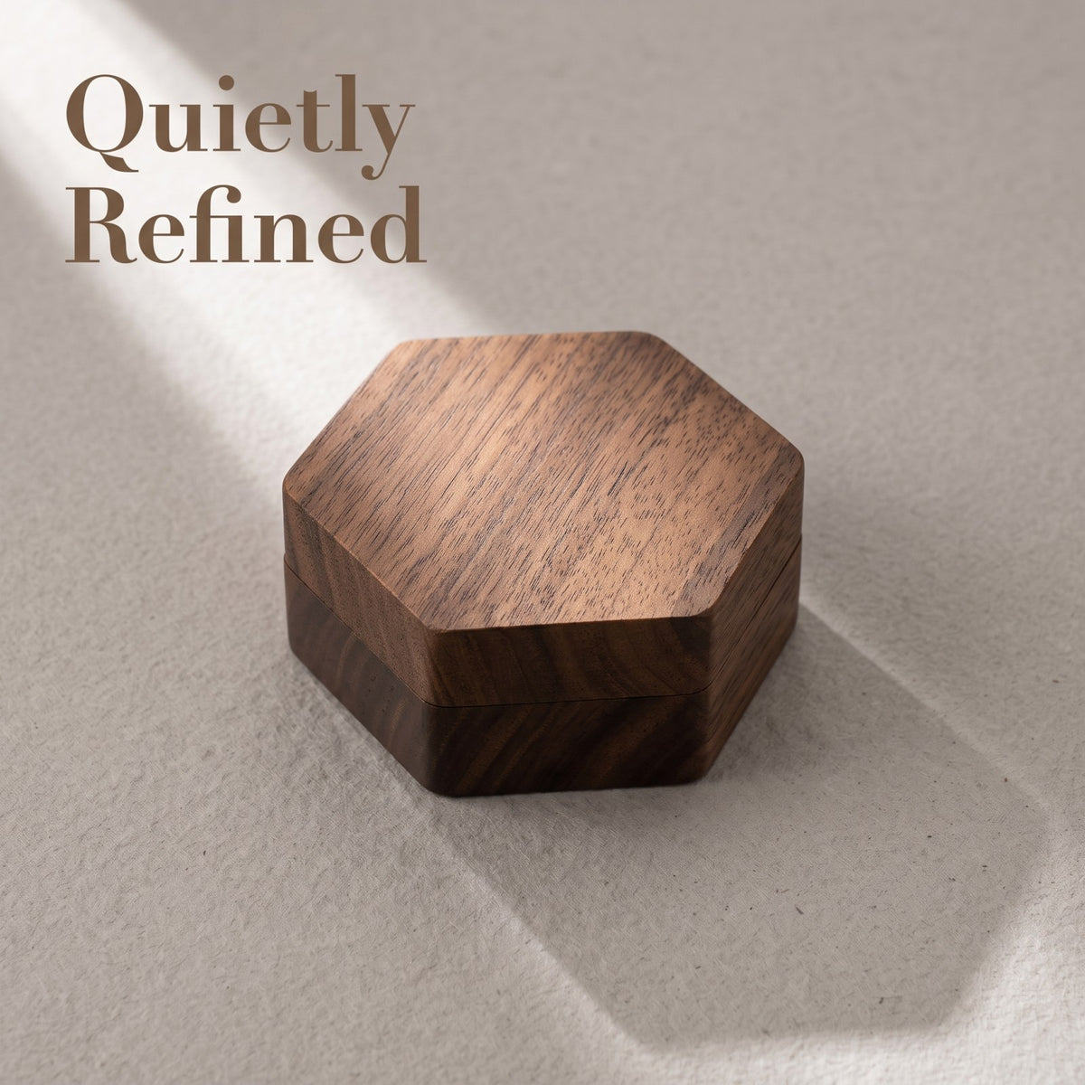 Walnut ring box closed, on a plain surface - Prism - MAHOOSIVE