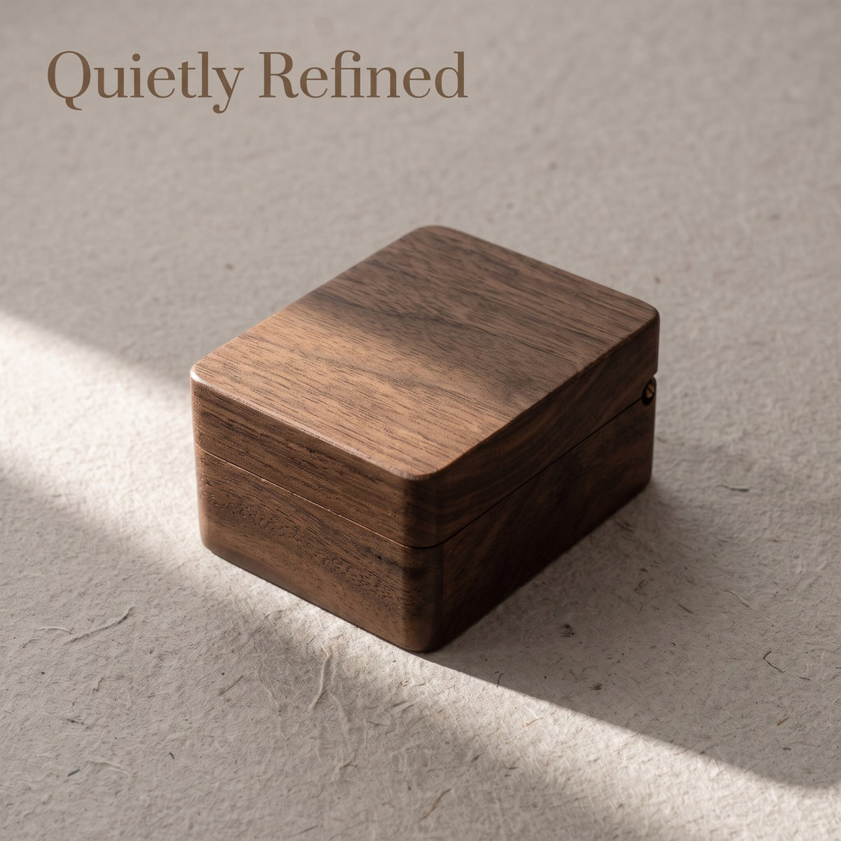 Walnut ring box closed, on a plain surface - Trio - MAHOOSIVE