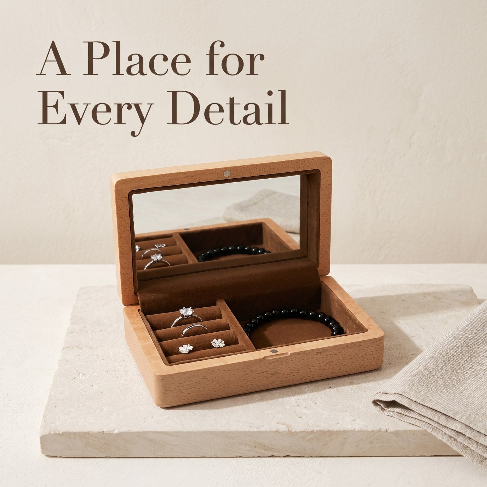 Walnut jewellery box holding rings and a bracelet - Vitrine: Seen Through Glass - MAHOOSIVE